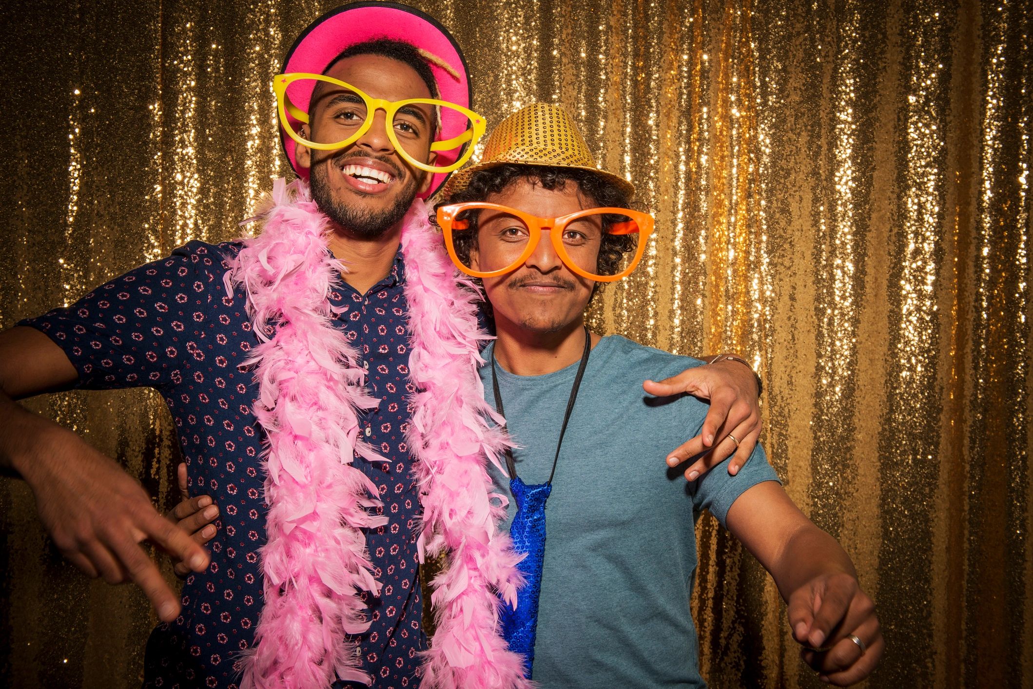 Elegant wedding photo booth setup with floral decorations